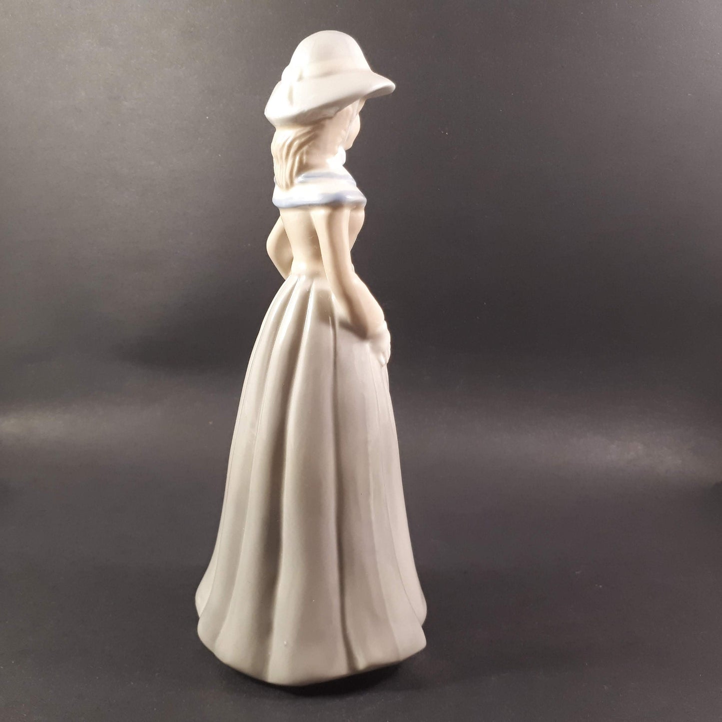 Beautiful Vintage European styled lady holding flower basket 8 " inches porcelain