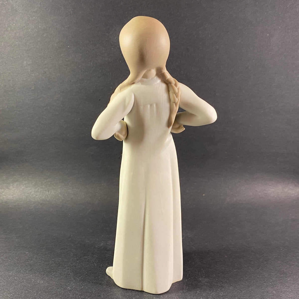 Retired NAO by Lladro Spain girl stretching matt finish Porcelain Figurine