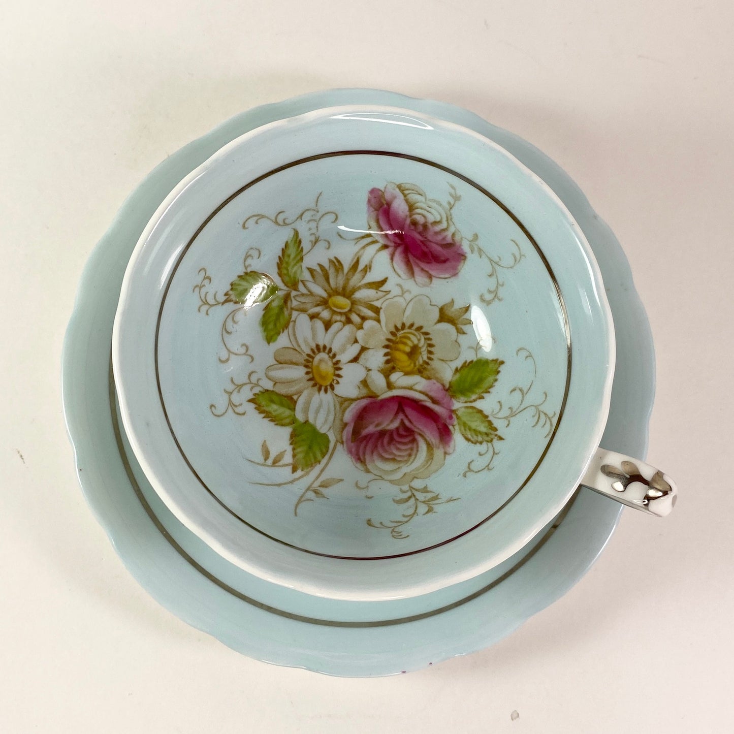 Vintage Gorgeous Paragon double warranted pale blue floral teacup and saucer