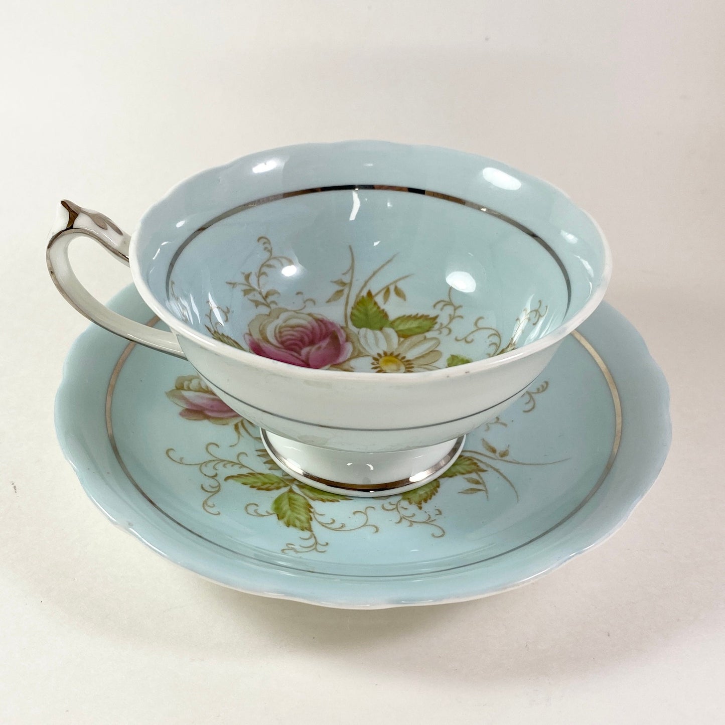 Vintage Gorgeous Paragon double warranted pale blue floral teacup and saucer