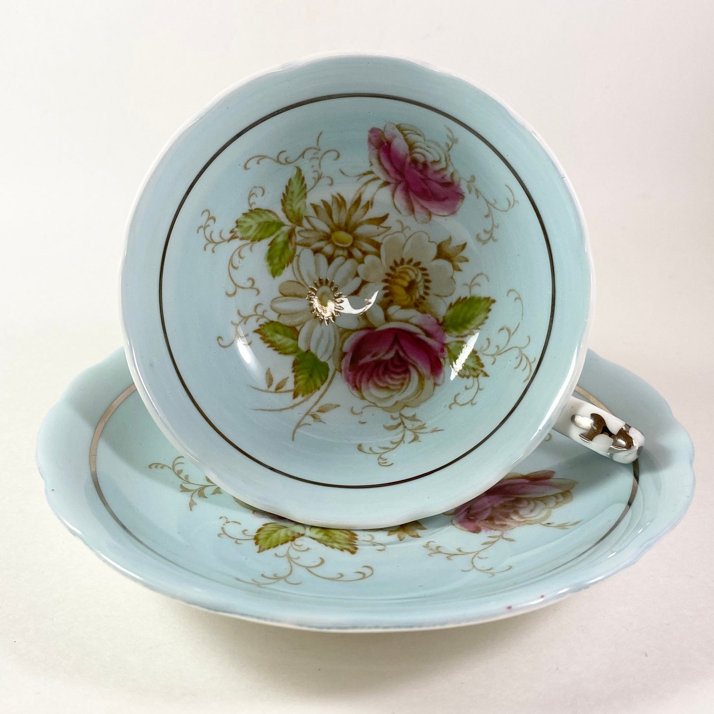 Vintage Gorgeous Paragon double warranted pale blue floral teacup and saucer