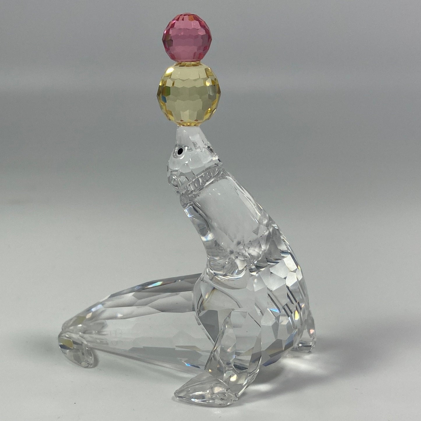 SWAROVSKI Crystal PLAYING SEAL With Pink and Yellow Balls 622526