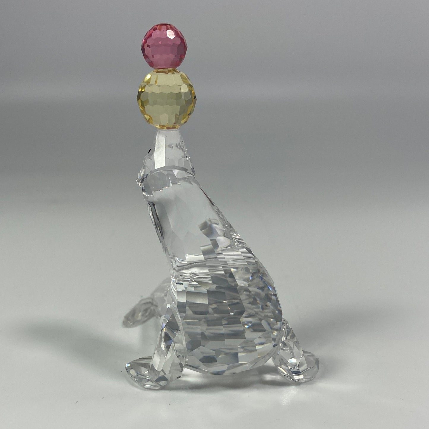 SWAROVSKI Crystal PLAYING SEAL With Pink and Yellow Balls 622526