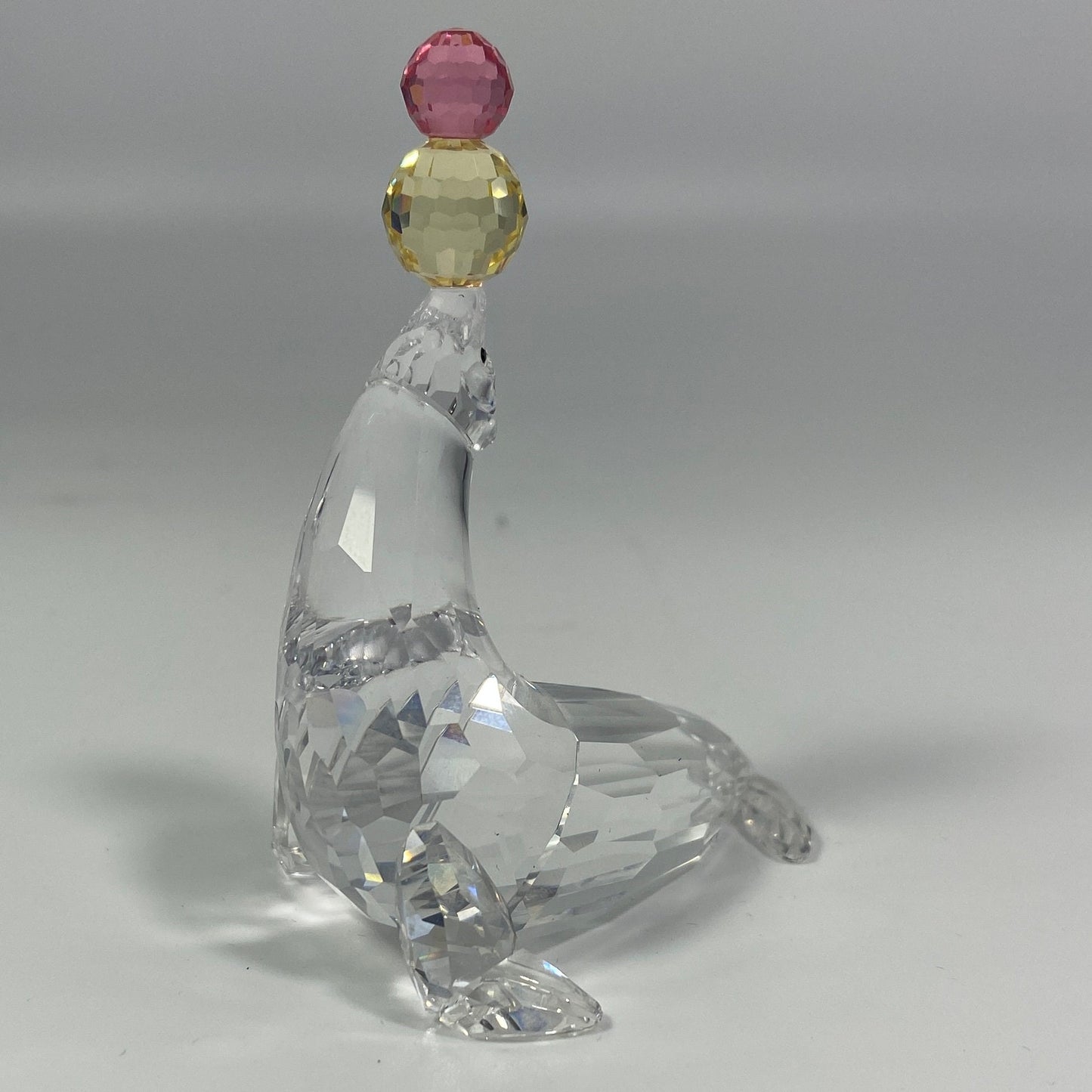 SWAROVSKI Crystal PLAYING SEAL With Pink and Yellow Balls 622526