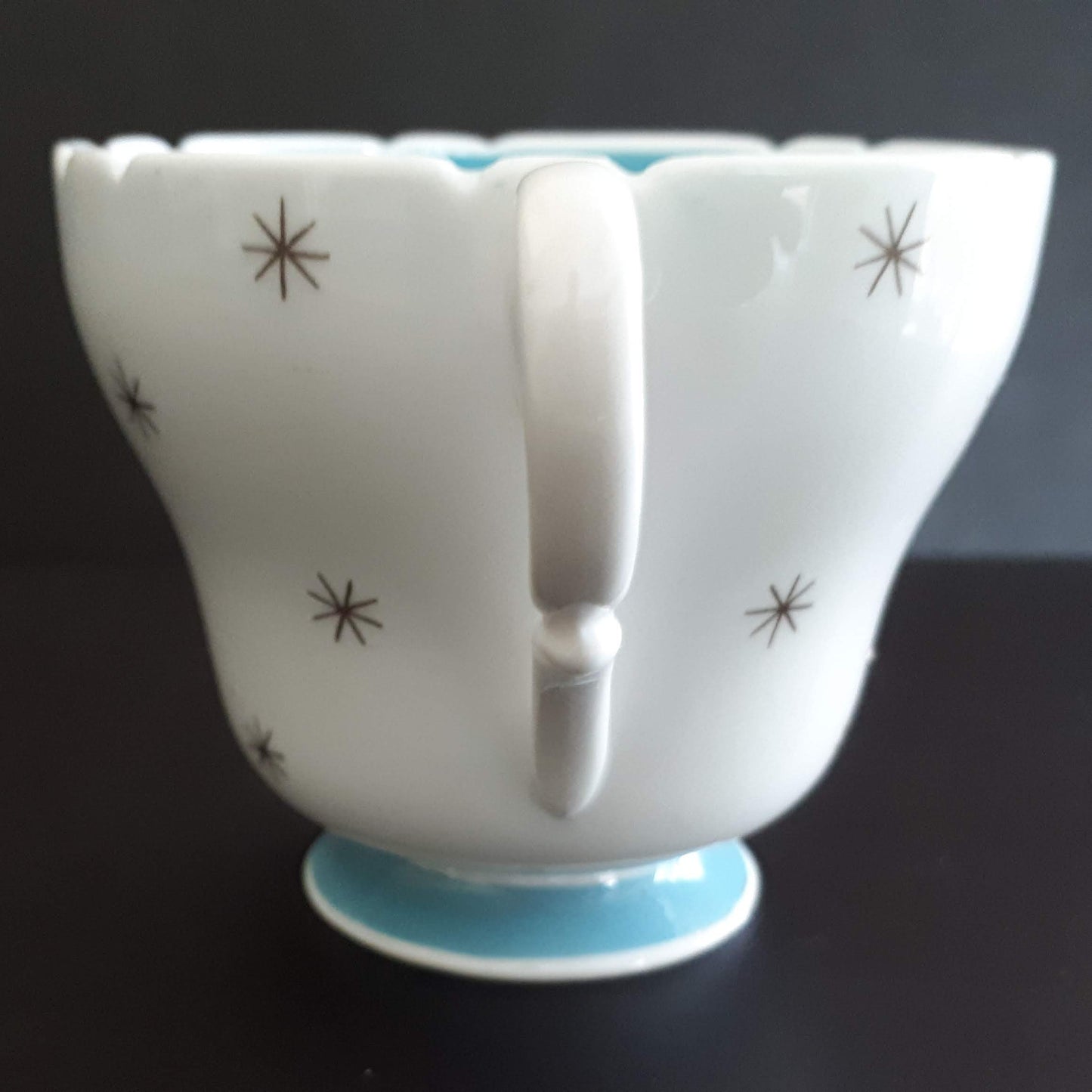 Shelley unique white cup with stars outside and sky blue interior