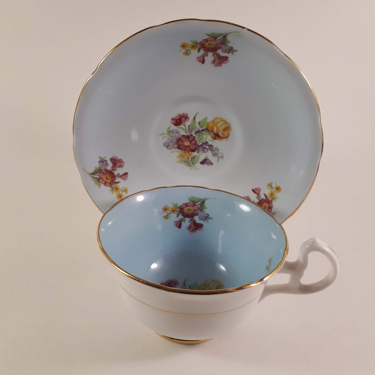 Vintage Unique Royal Stafford blue Wide mouth teacup and saucer.