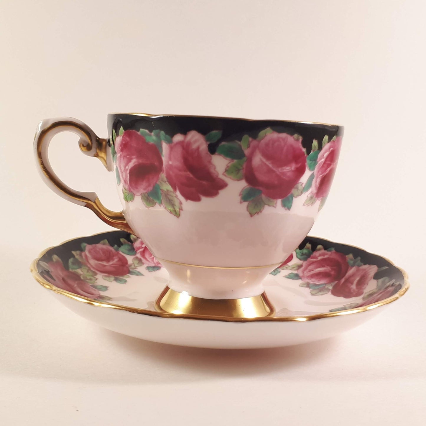 Pretty Vintage Tuscan Pink Roses Garland design on pink shade teacup and saucer