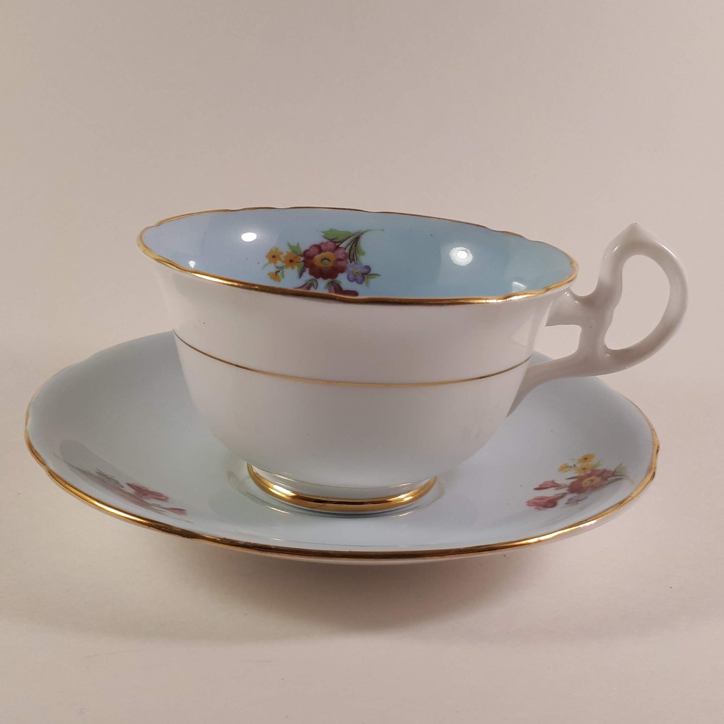 Vintage Unique Royal Stafford blue Wide mouth teacup and saucer.