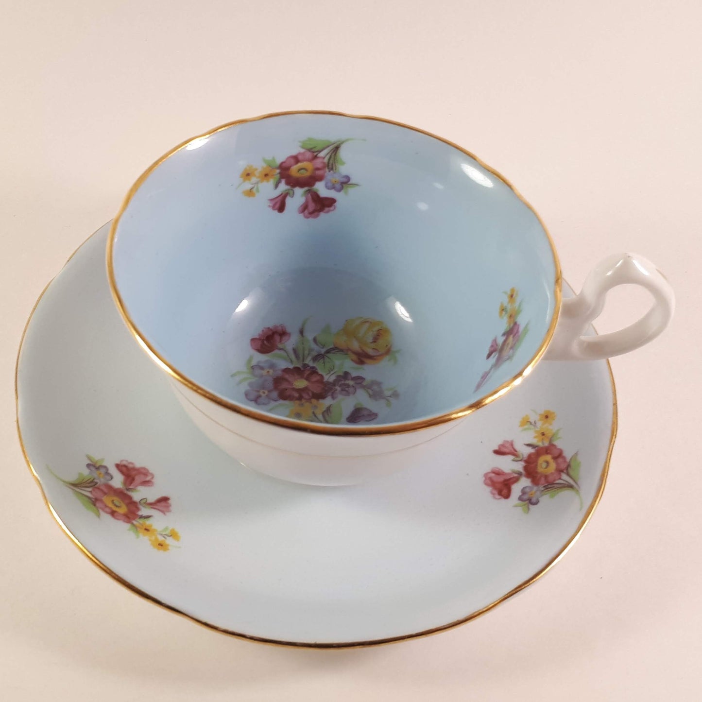 Vintage Unique Royal Stafford blue Wide mouth teacup and saucer.