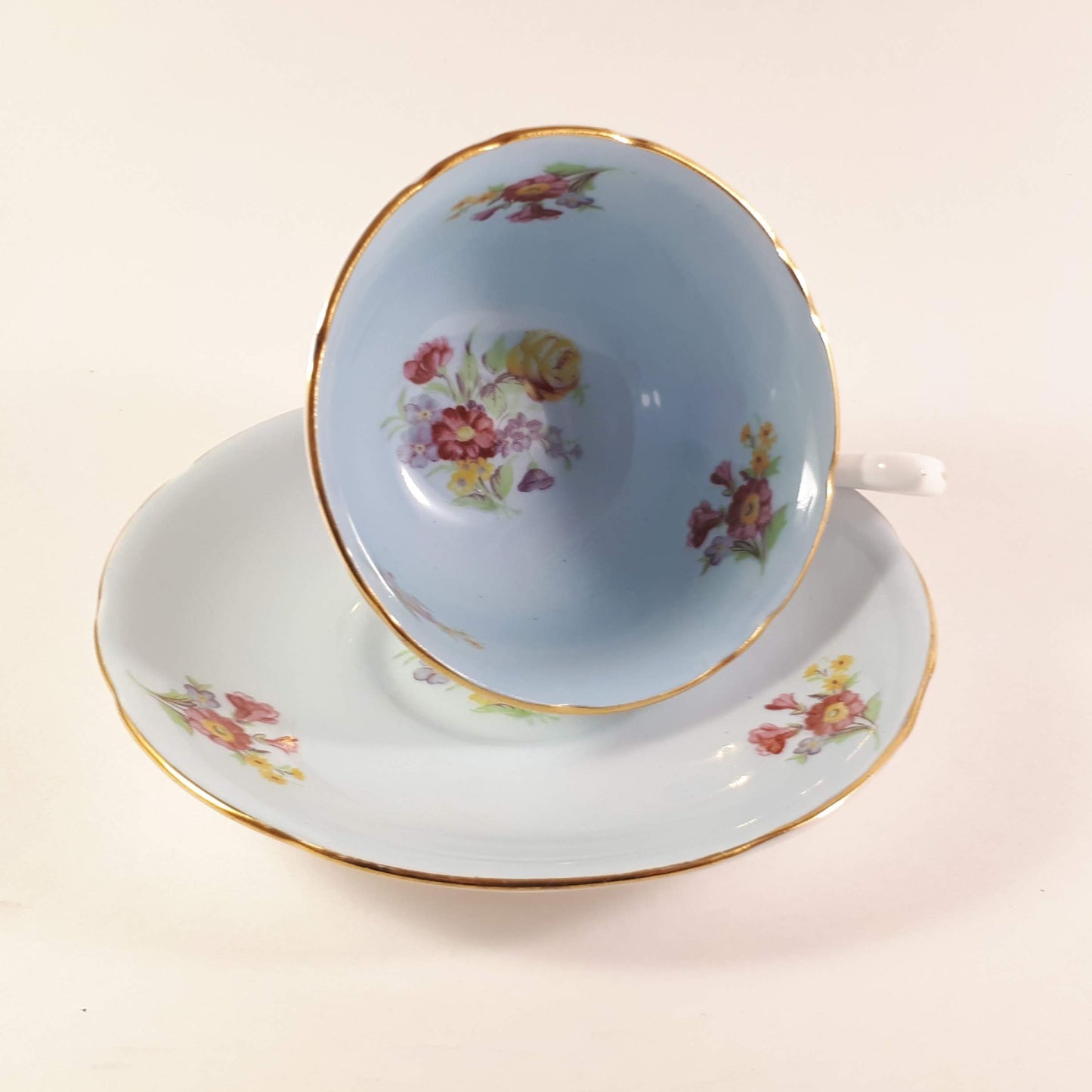 Vintage Unique Royal Stafford blue Wide mouth teacup and saucer.