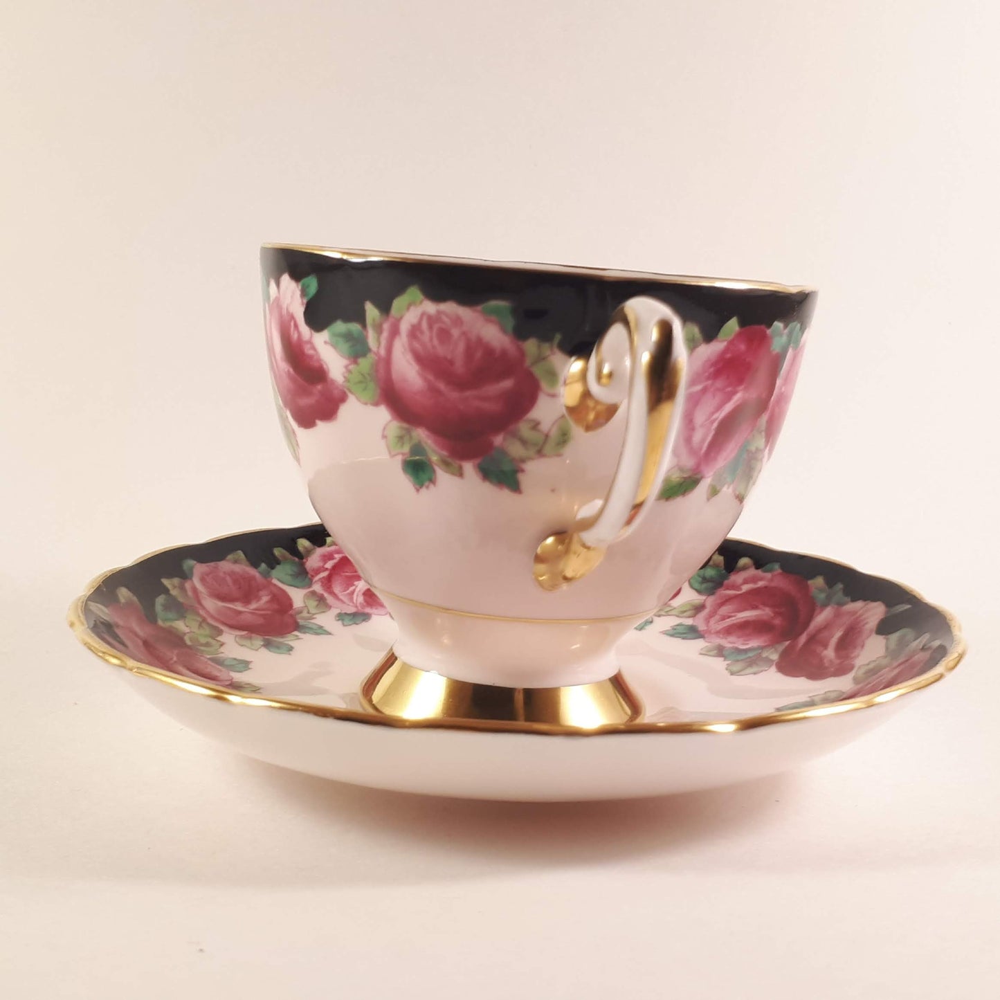 Pretty Vintage Tuscan Pink Roses Garland design on pink shade teacup and saucer