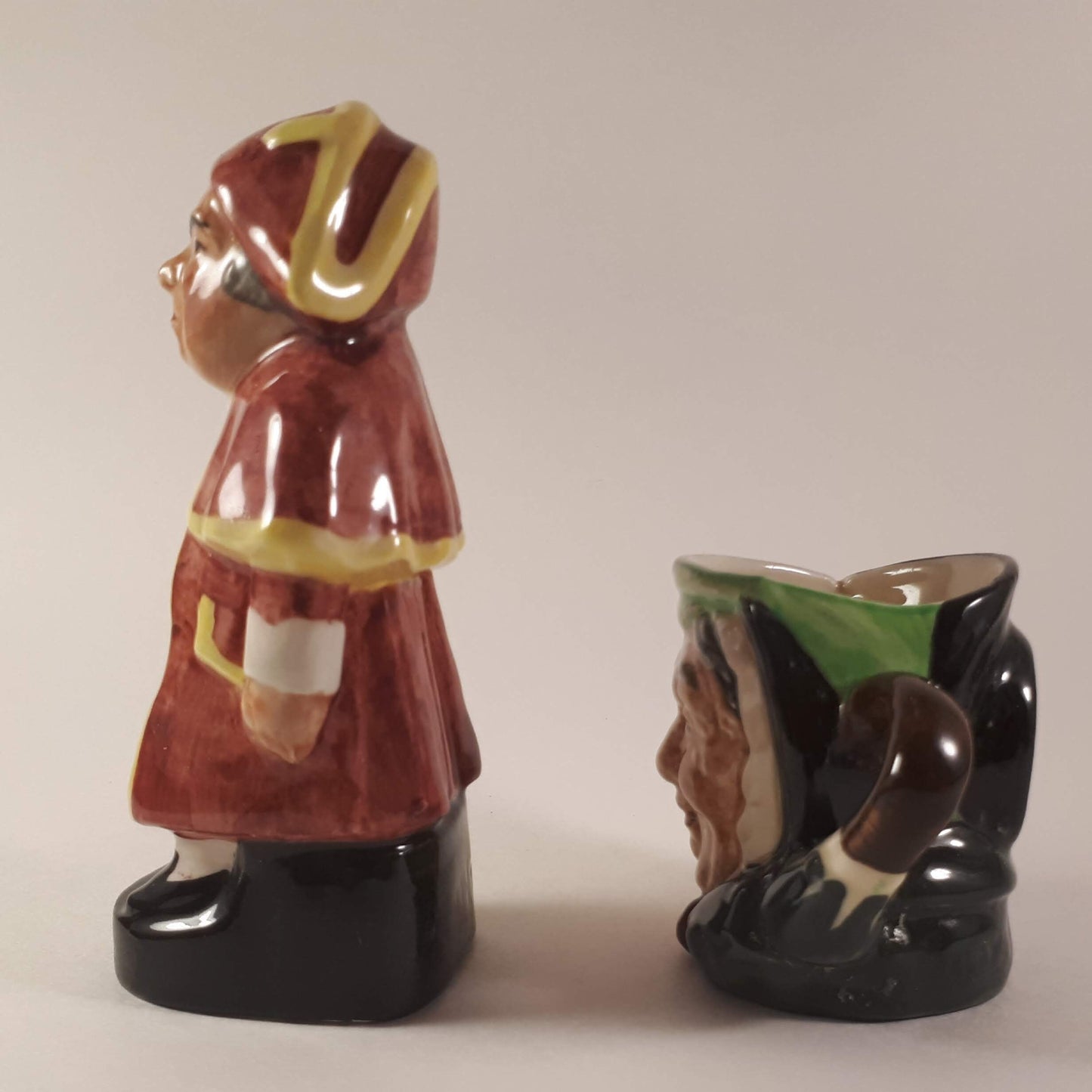 Set of Royal Doulton small toby mug and Artone England beadley figurine