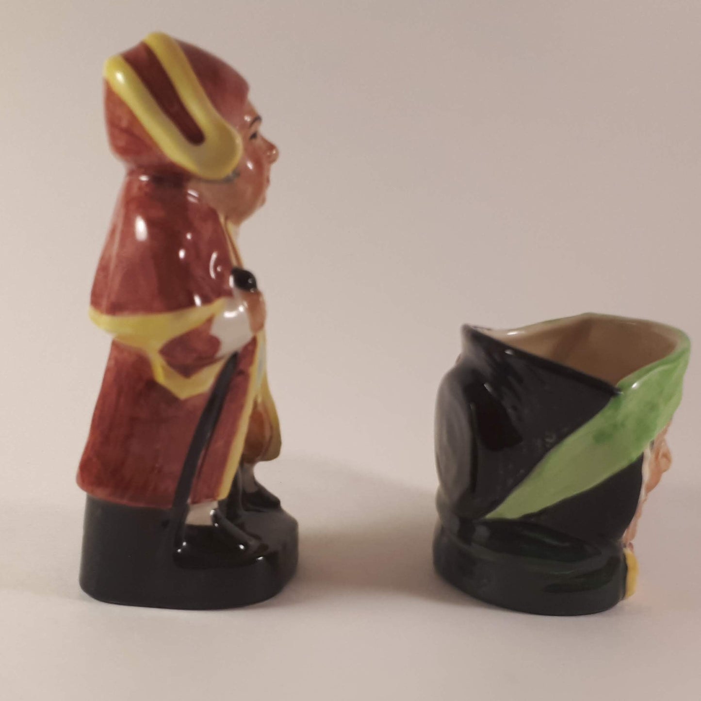 Set of Royal Doulton small toby mug and Artone England beadley figurine