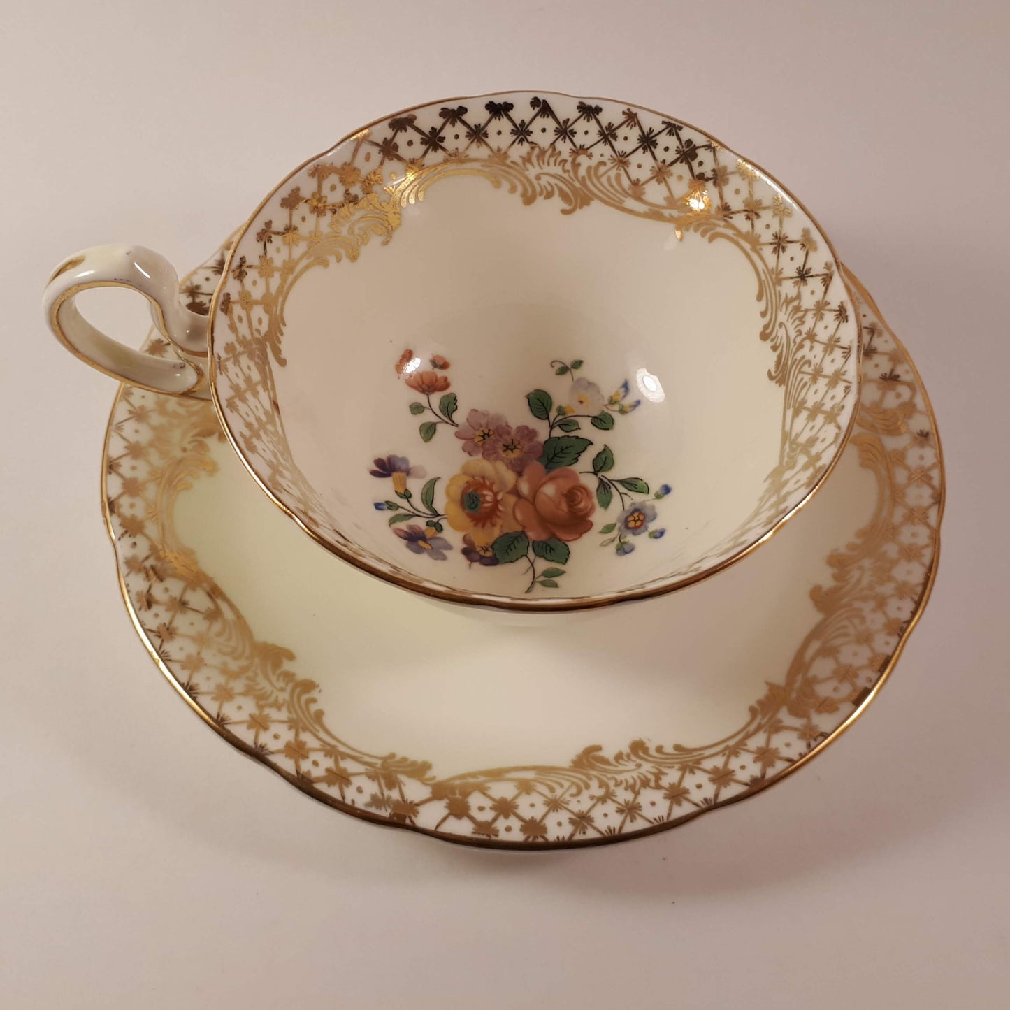 RARE !! Aynsley wide mouthed pale yellow teacup and saucer gold gilt