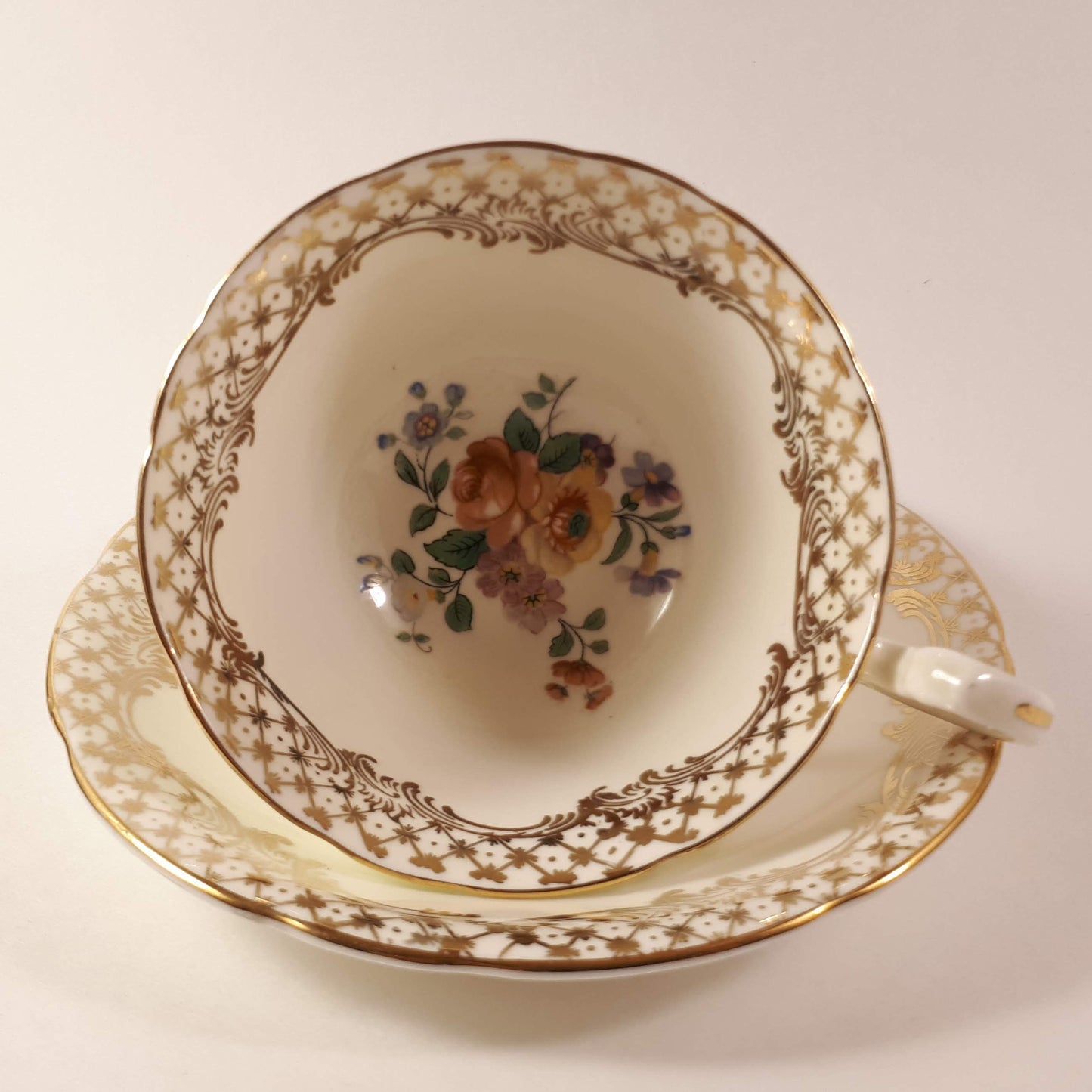 RARE !! Aynsley wide mouthed pale yellow teacup and saucer gold gilt