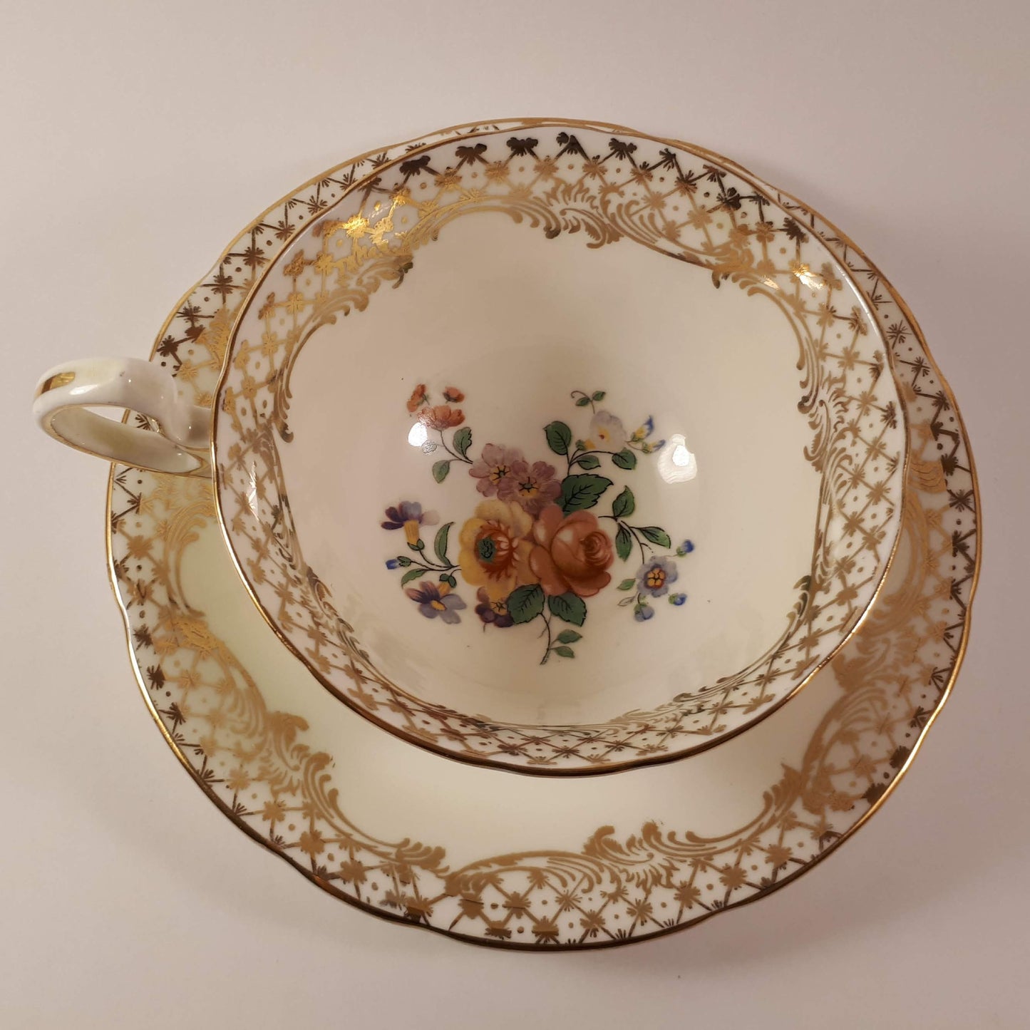 RARE !! Aynsley wide mouthed pale yellow teacup and saucer gold gilt