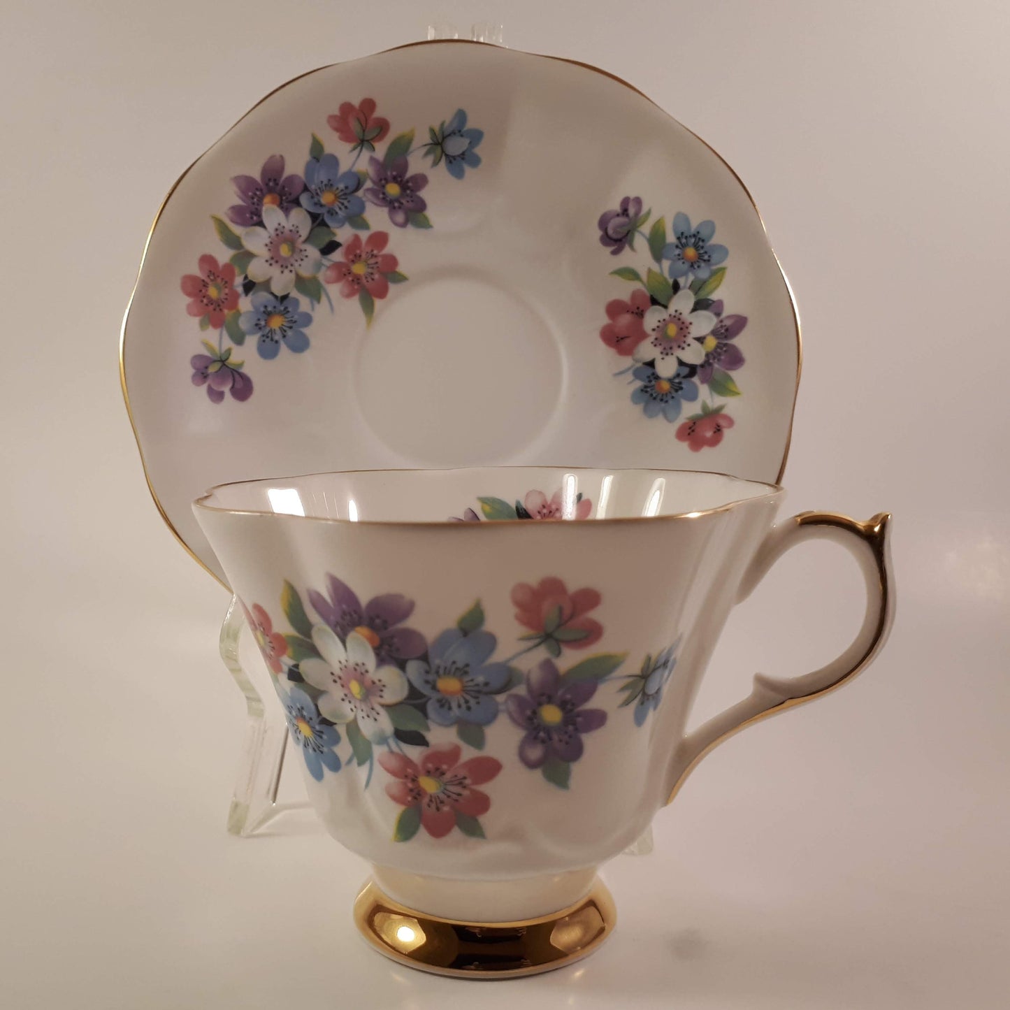 Gorgeous Queen Anne multicolored floral bone china teacup and saucer