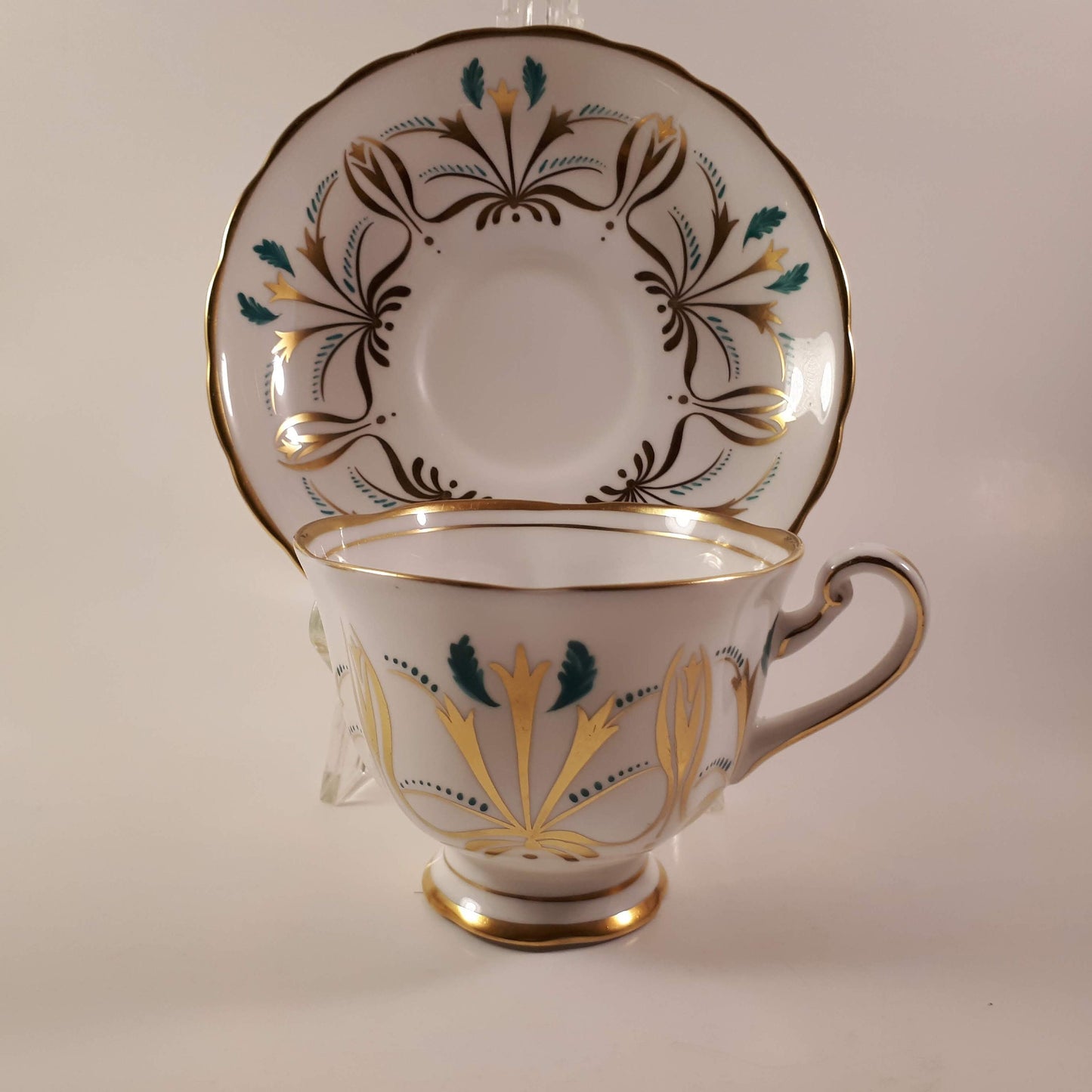 Beautiful Royal Chelsea entirely hand decorated bone china Teacup and Saucer