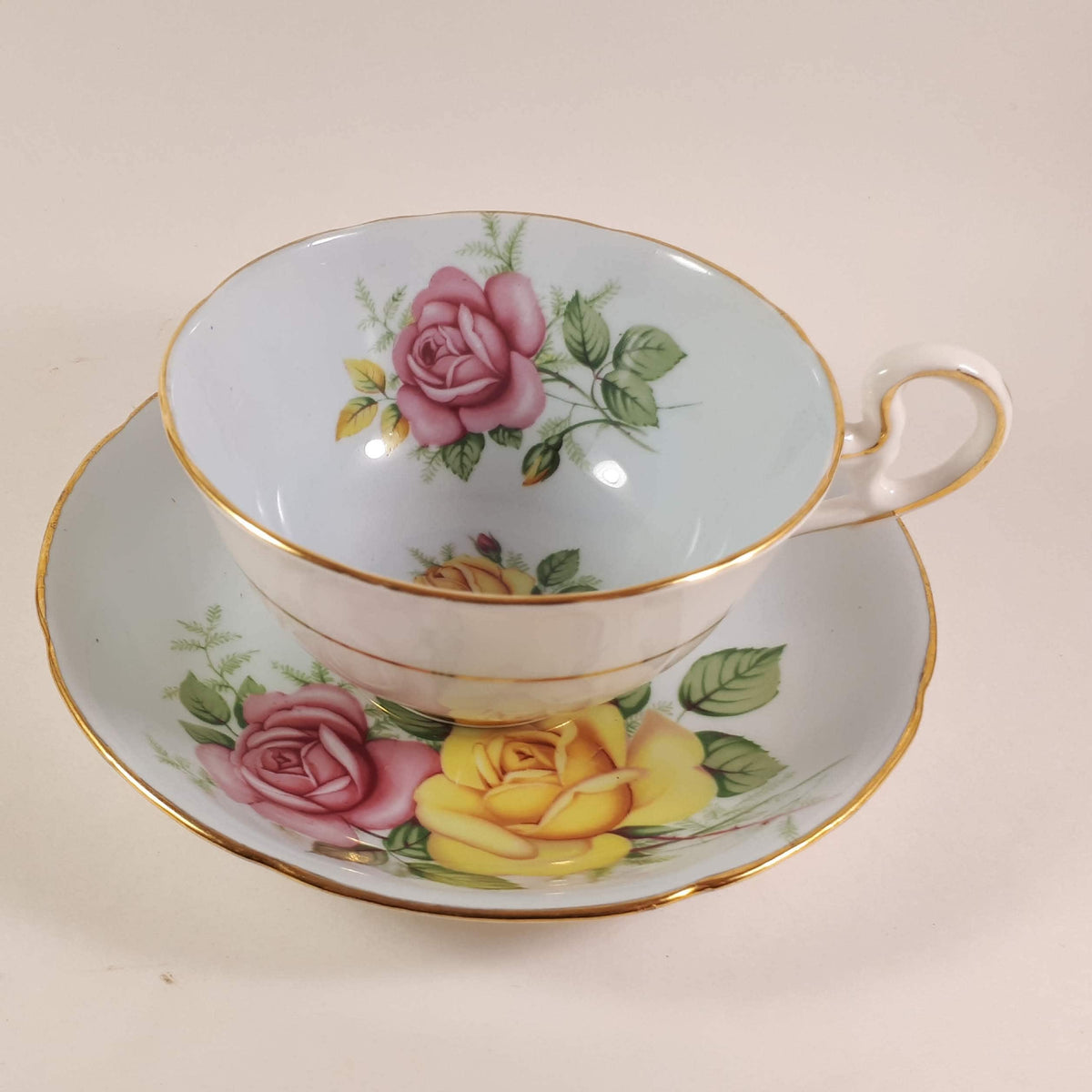 Royal Grafton 1950s Pink and Yellow  Roses with blue shade Teacup & saucer