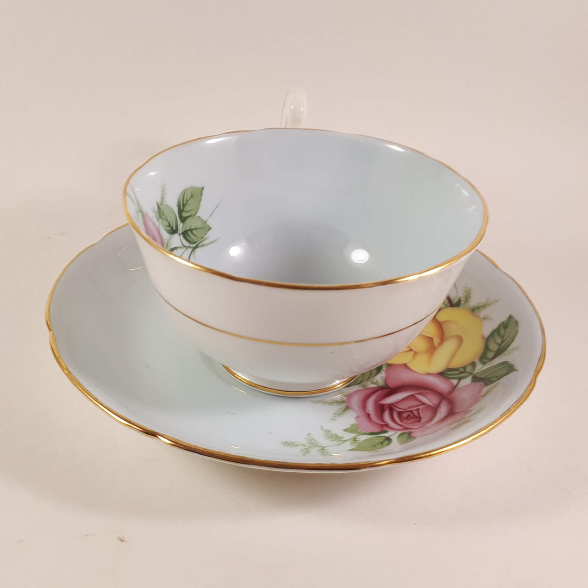 Royal Grafton 1950s Pink and Yellow  Roses with blue shade Teacup & saucer