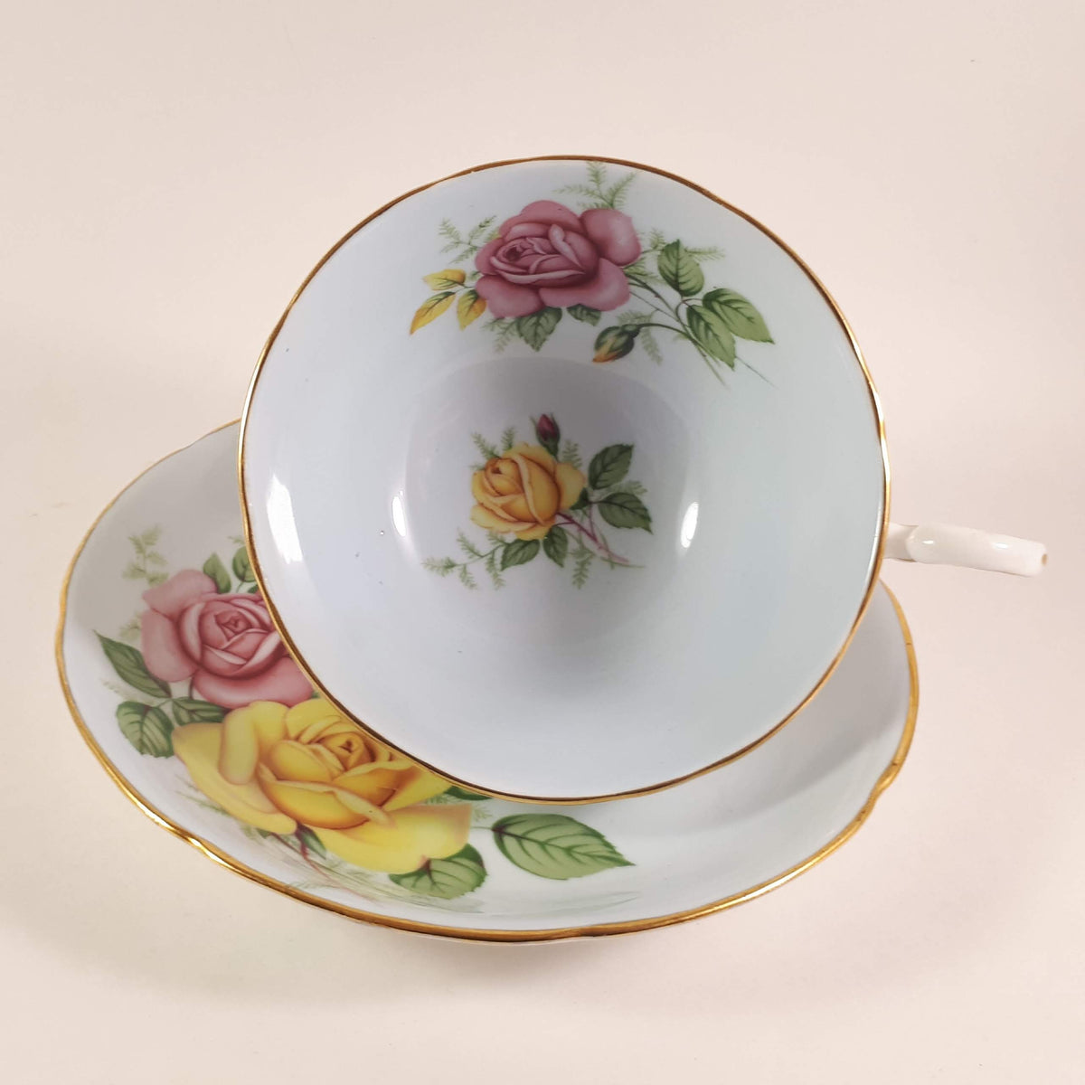 Royal Grafton 1950s Pink and Yellow  Roses with blue shade Teacup & saucer