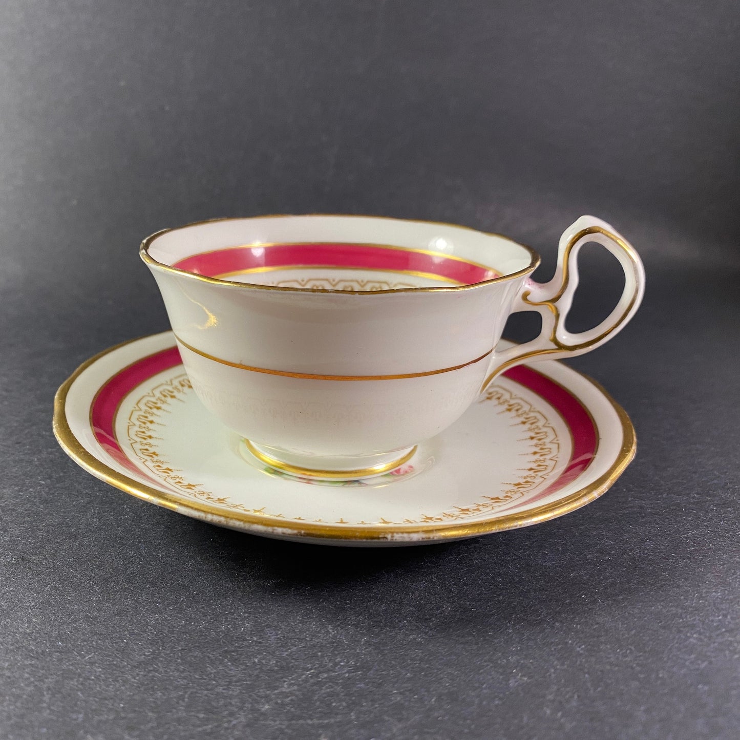 Vintage Royal Stafford bone china with floating roses teacup and saucer
