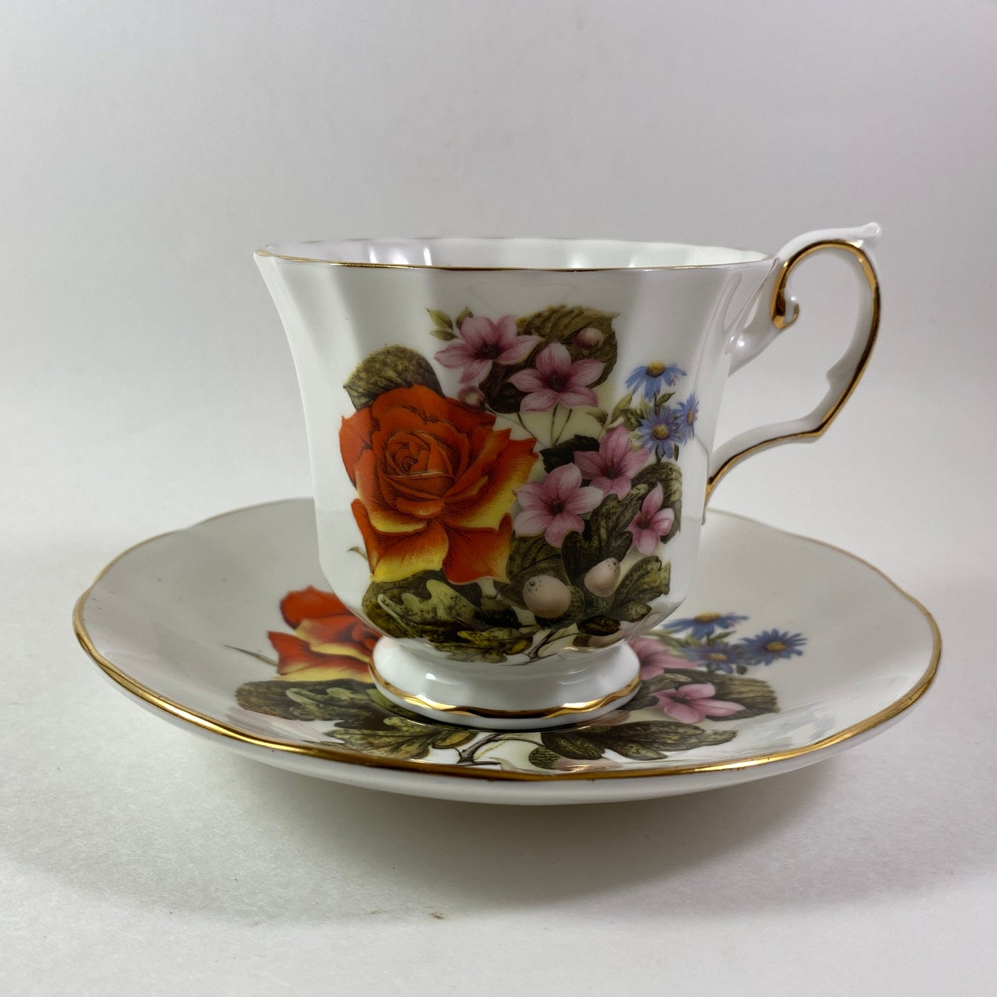 RARE !! Elizabethan Flowers of the season Vibrant Bone china Teacup and Saucer