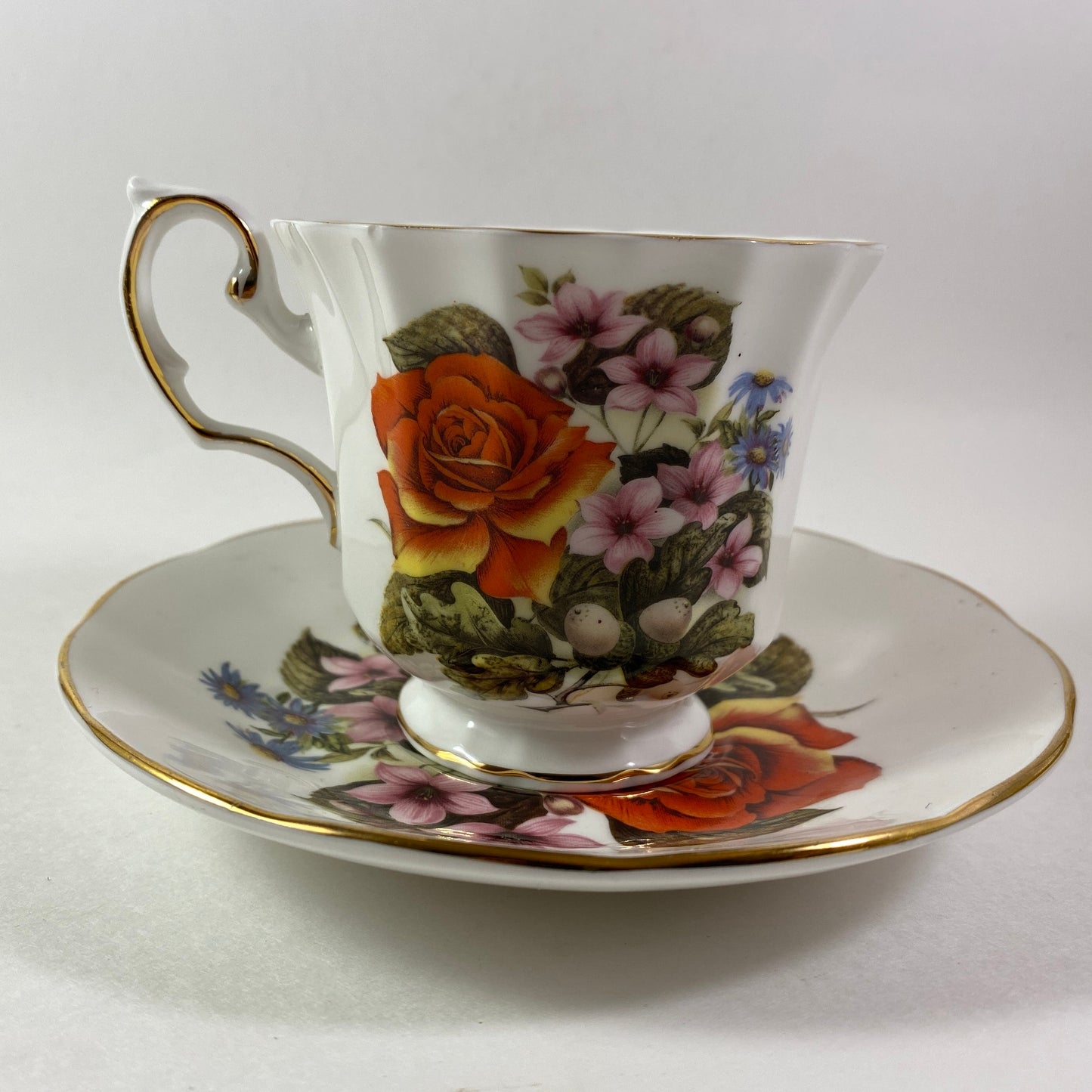 RARE !! Elizabethan Flowers of the season Vibrant Bone china Teacup and Saucer