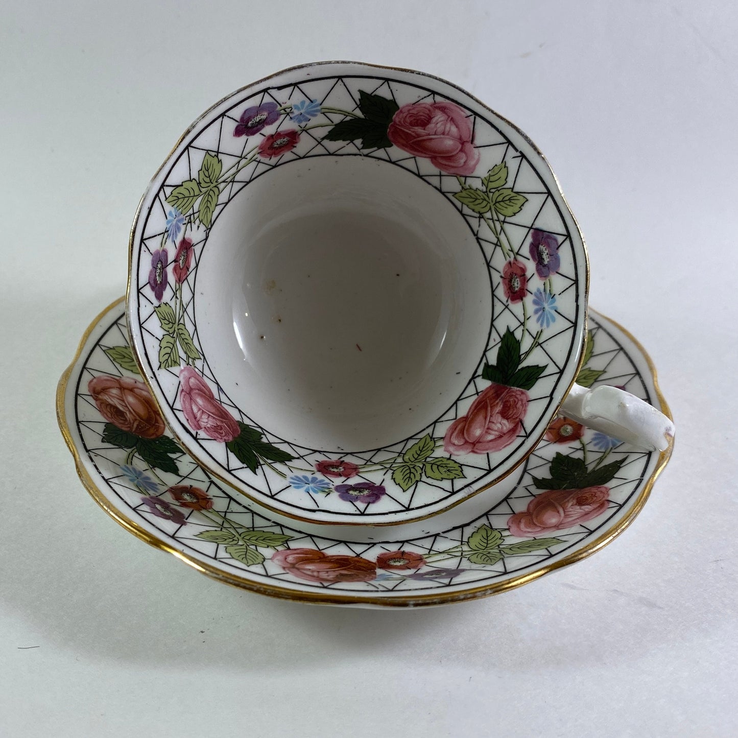 Antique Crown England floral bone china teacup and saucer