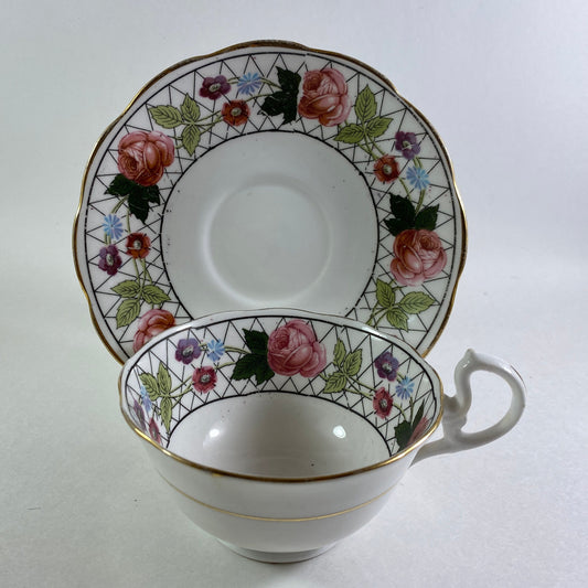 Antique Crown England floral bone china teacup and saucer