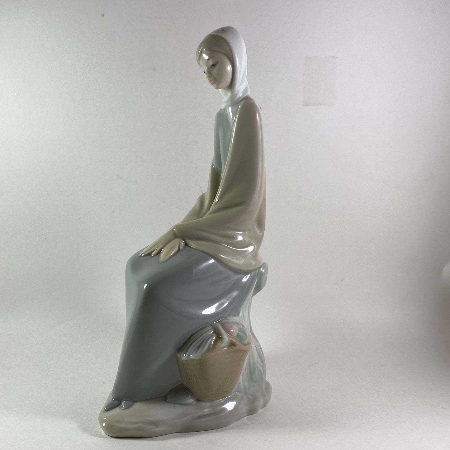 RARE Beautiful 9" Nao by Lladro girl sitting on a trunk with basket by her side