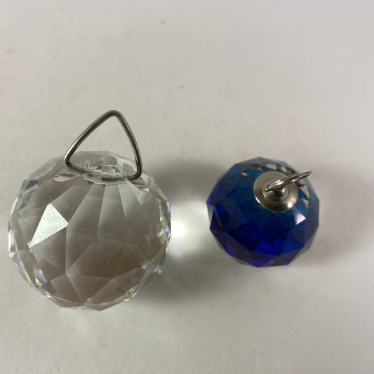 Set of two Swarovski clear and blue hanging crystal spheres