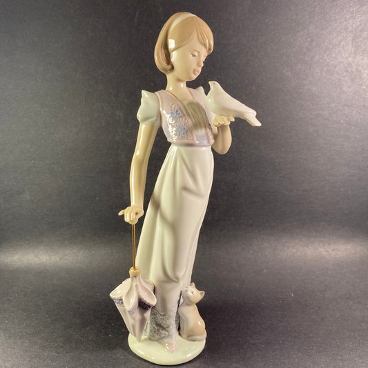 Lladro "Summer Stroll" # 7611 girl with dove in her hand and Kitten by her side