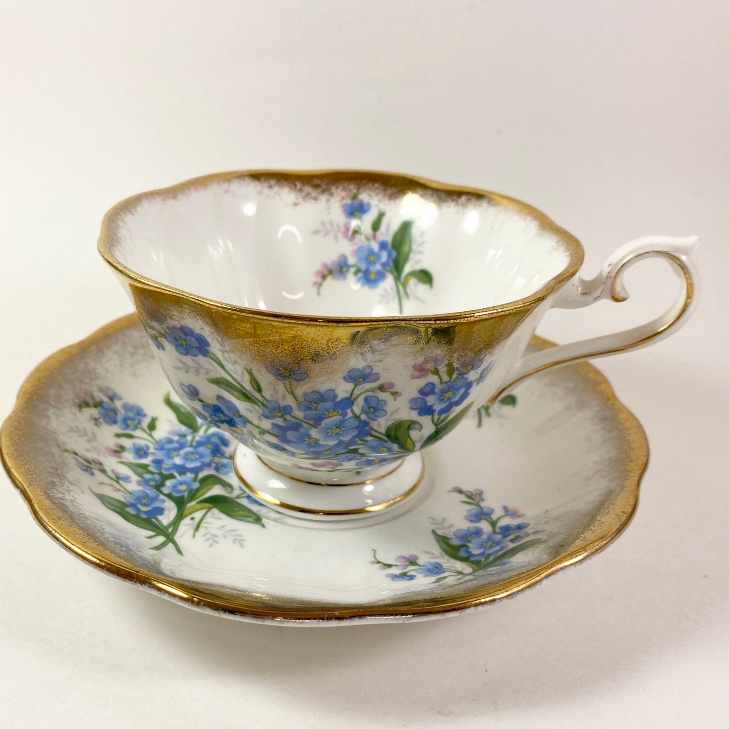 Extremely Rare Royal albert Forget me not heavy gold cup and saucer