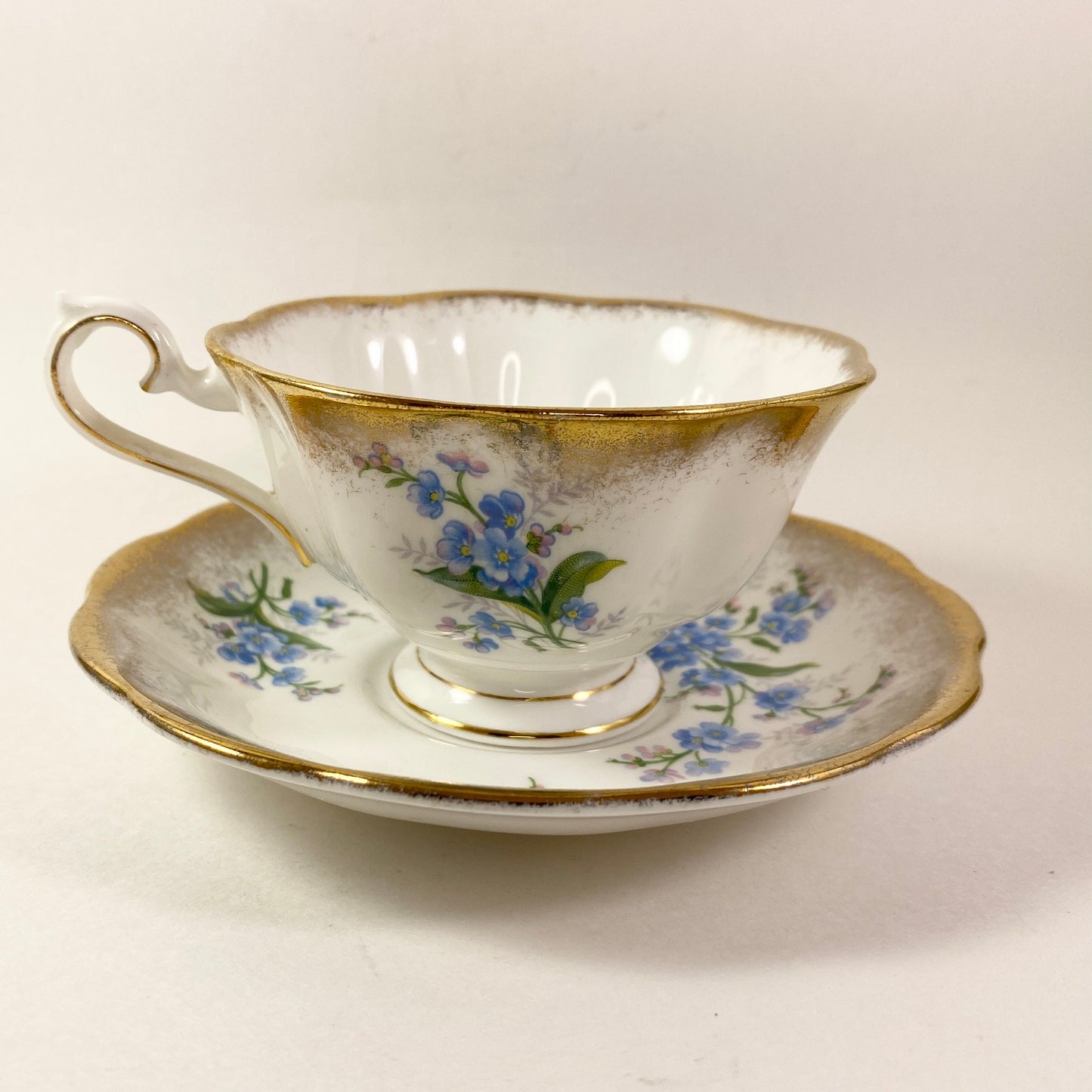 Extremely Rare Royal albert Forget me not heavy gold cup and saucer