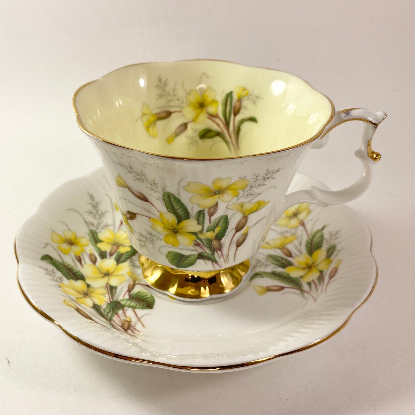 RARE!! Royal Albert Friendship Primrose yellow interior footed Tea Cup &Saucer