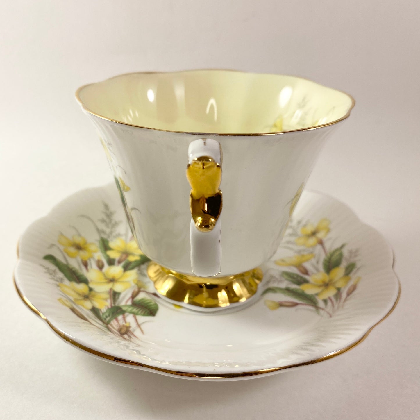 RARE!! Royal Albert Friendship Primrose yellow interior footed Tea Cup &Saucer