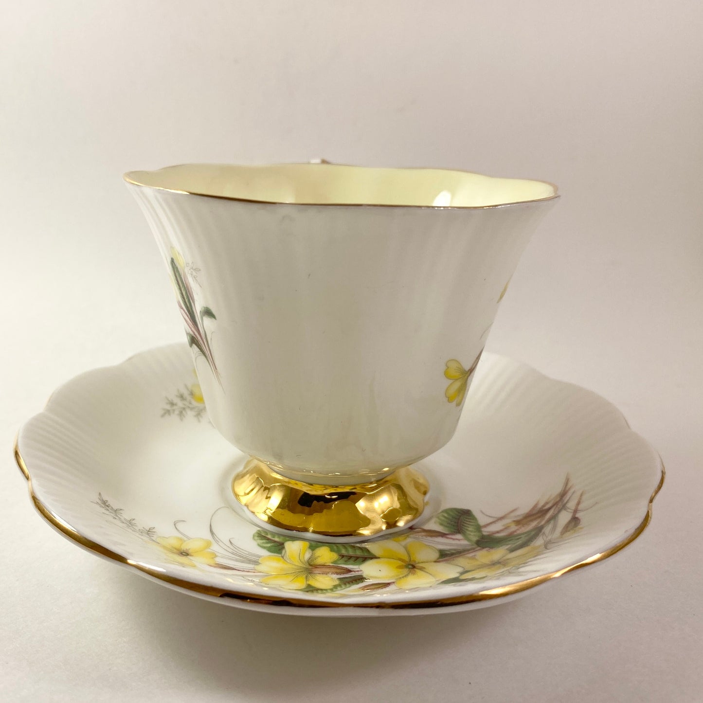 RARE!! Royal Albert Friendship Primrose yellow interior footed Tea Cup &Saucer