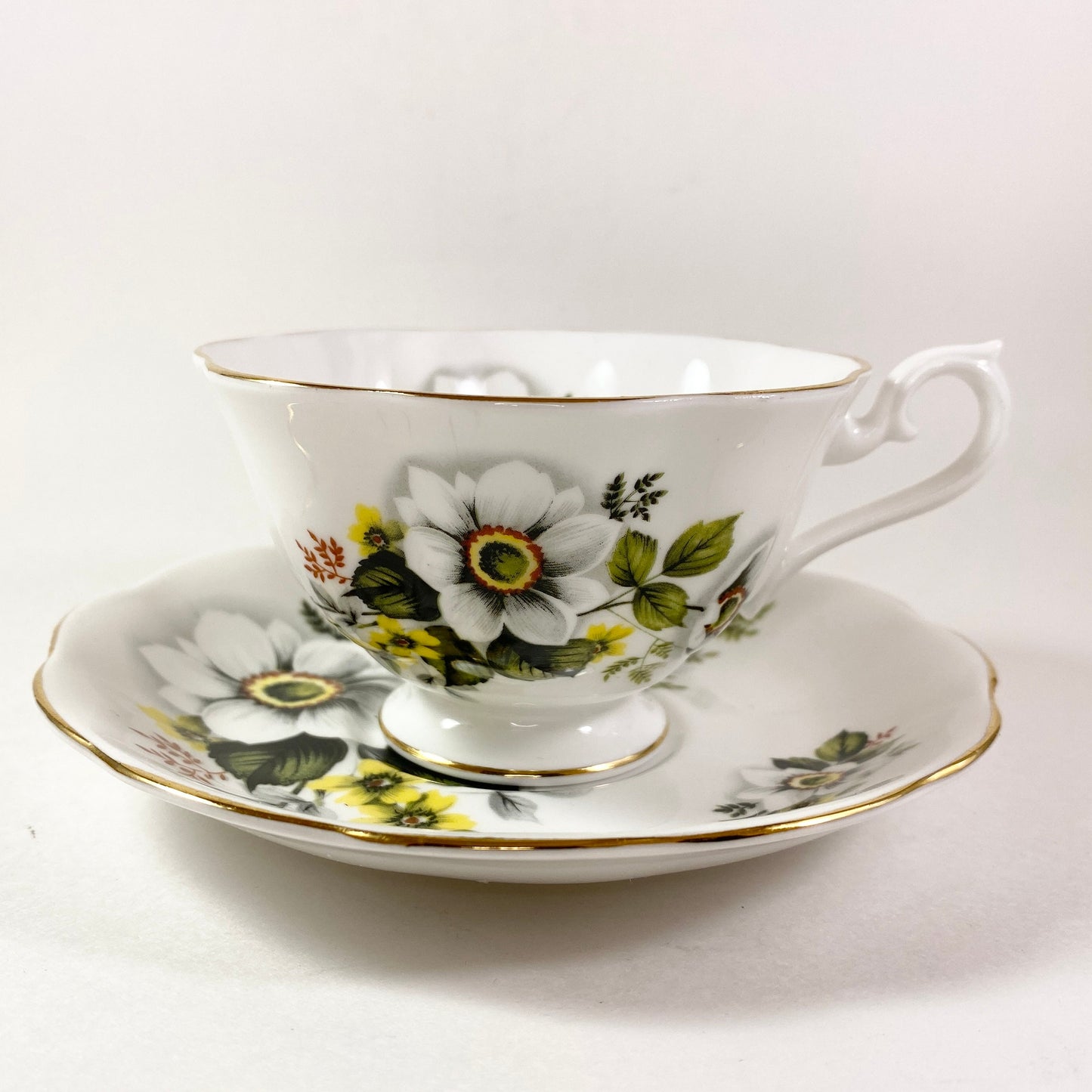 RARE Royal Albert wide mouthed white and Yellow floral bone china teacup & saucer