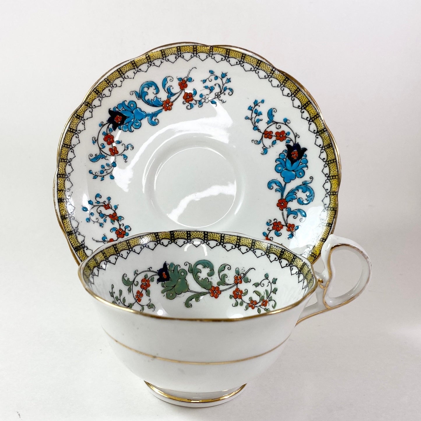 Antique Royal Albert crown china wide mouthed hand painted teacup and saucer