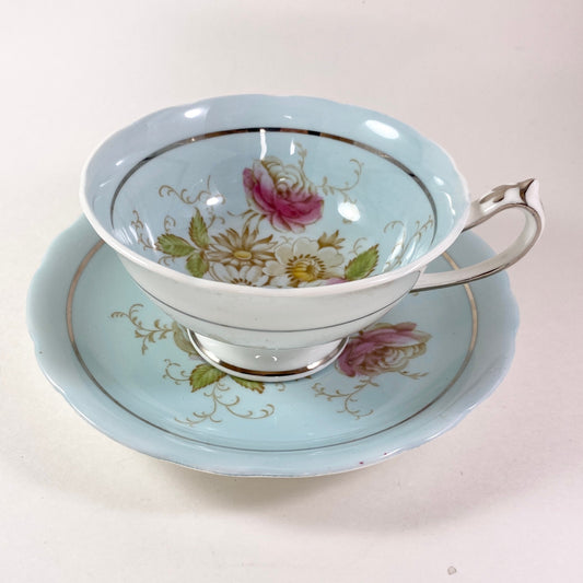 Vintage Gorgeous Paragon double warranted pale blue floral teacup and saucer