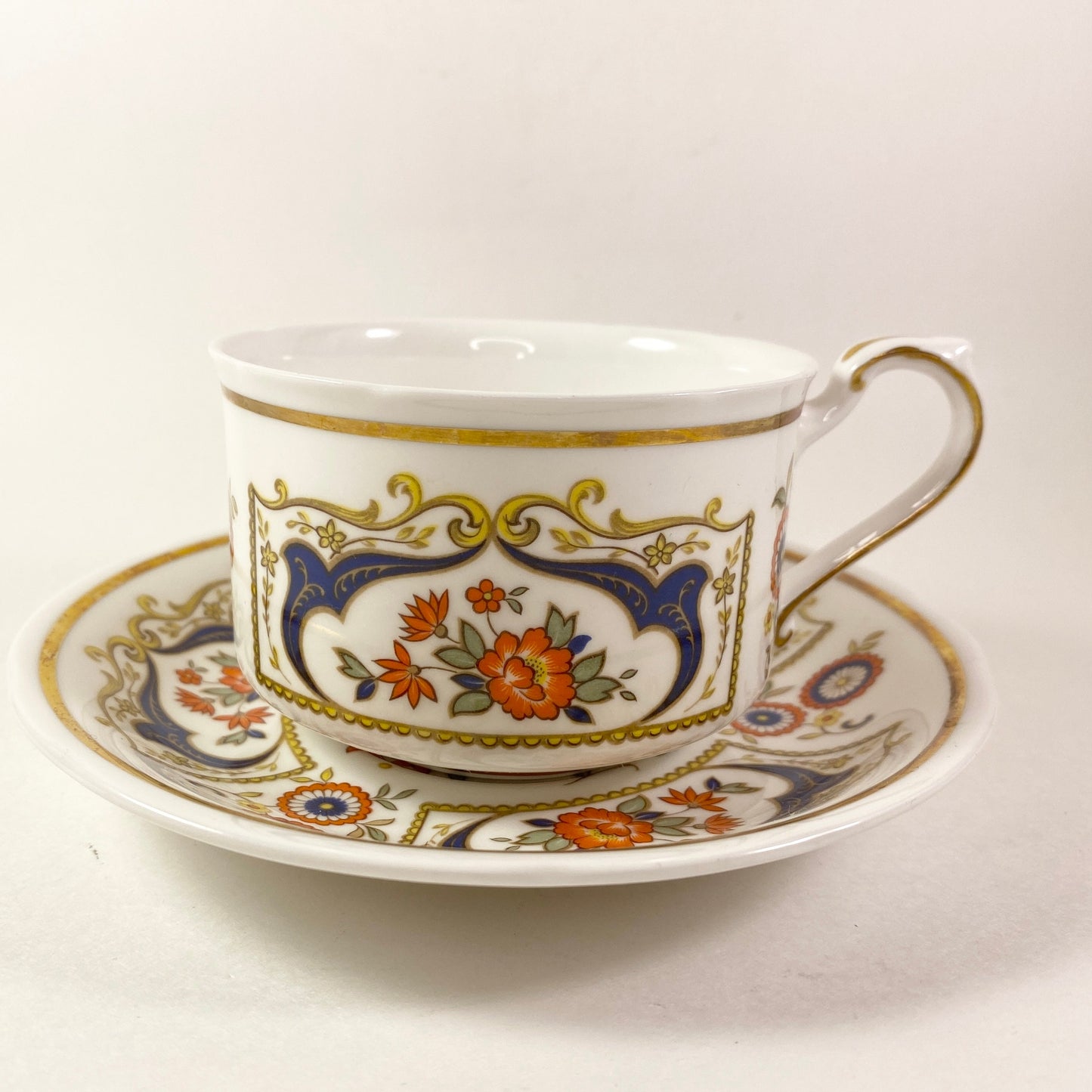 Exteremly RARE Paragon Chelsea Rust Flowers, Blue yellow scrolls teacup saucer