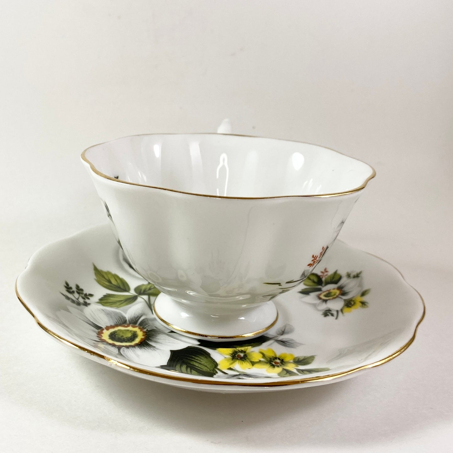 RARE Royal Albert wide mouthed white and Yellow floral bone china teacup & saucer