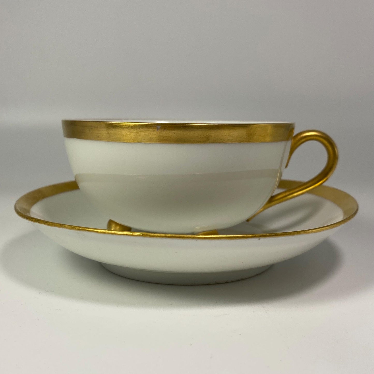 Antique MZ Austria  white and gold footed China Teacup & Saucer