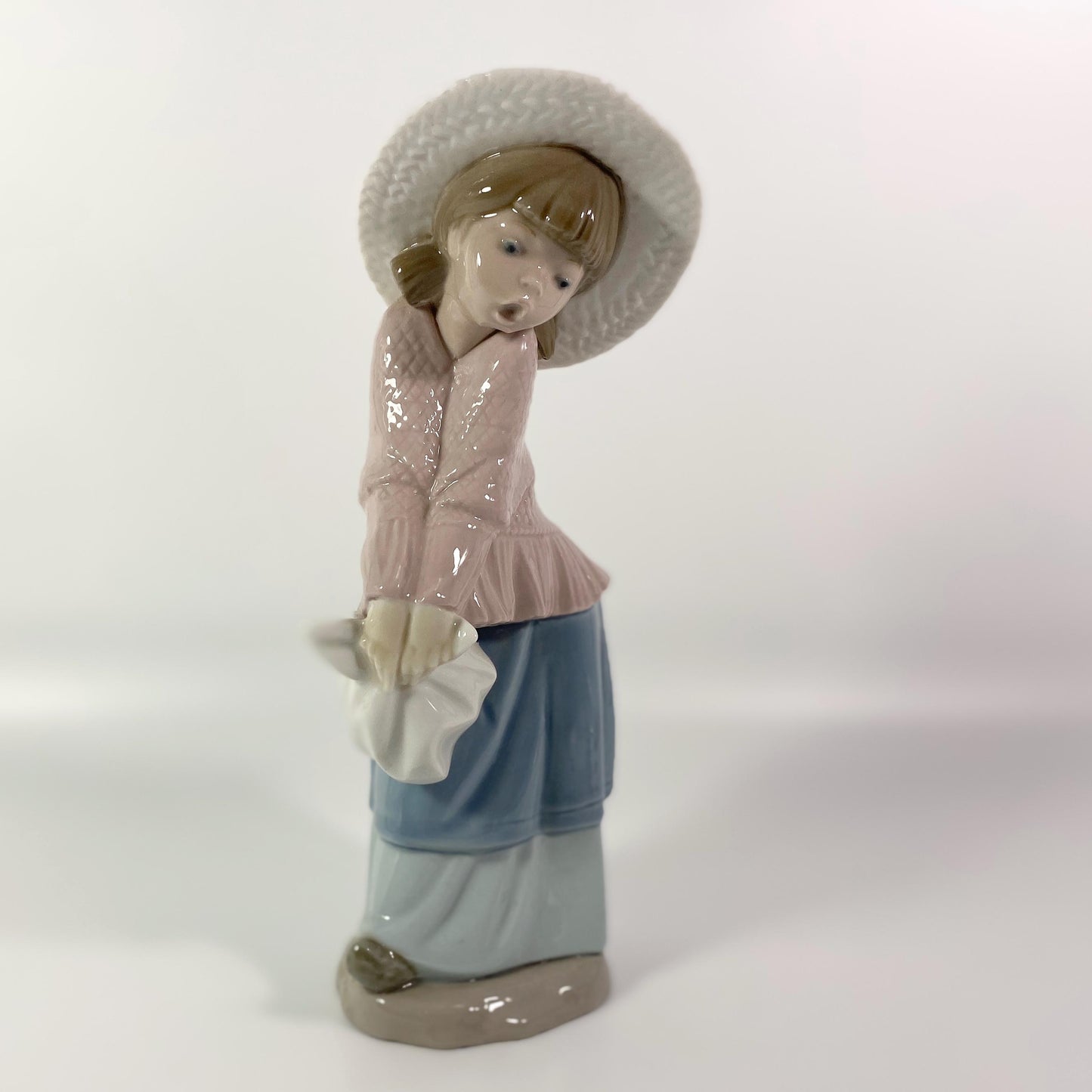 LLadro Nao Girl in Pink Poncho & Bonnet 9" inches pretty figurine
