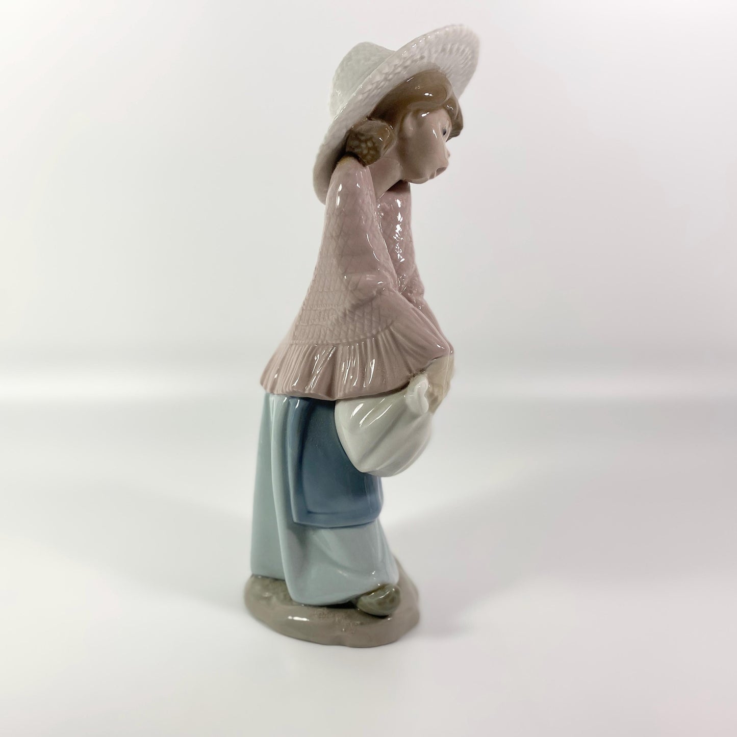 LLadro Nao Girl in Pink Poncho & Bonnet 9" inches pretty figurine