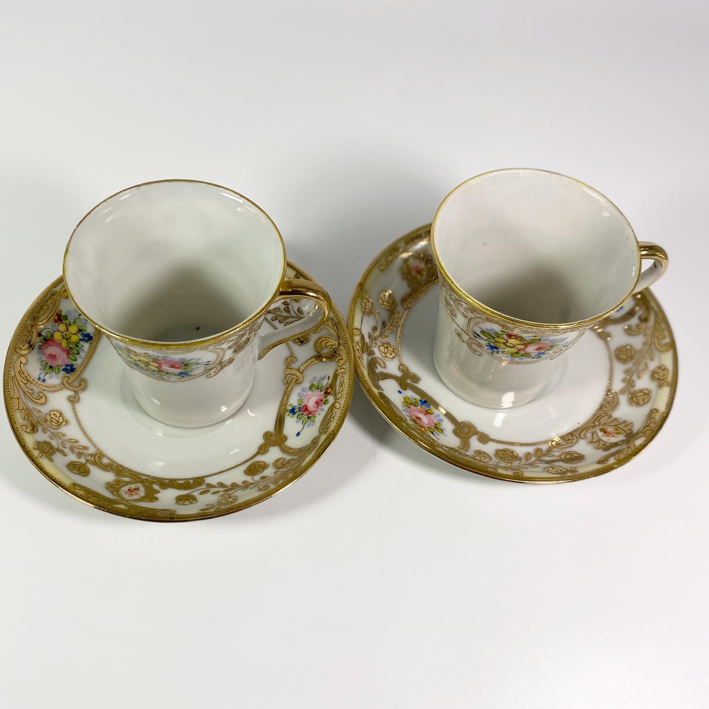 Antique set of 2 Gold encrusted hand painted  cup and saucer shamrock back stamp