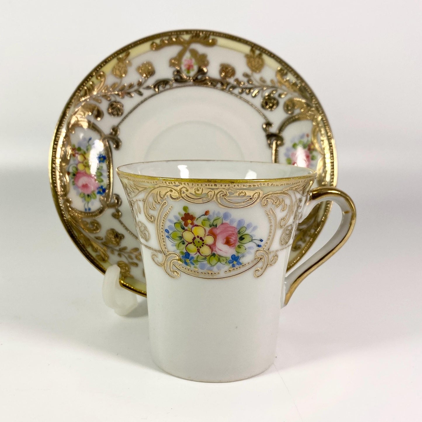Antique set of 2 Gold encrusted hand painted  cup and saucer shamrock back stamp