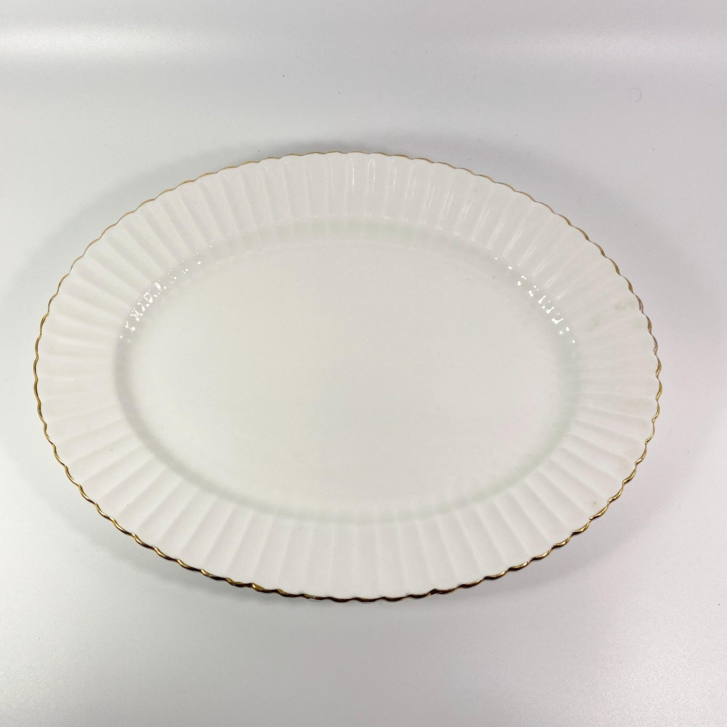 Paragon all white oval serving platter 13 " Fluted rim gold trim