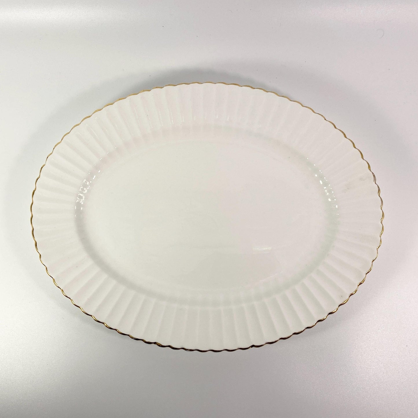 Paragon all white oval serving platter 13 " Fluted rim gold trim
